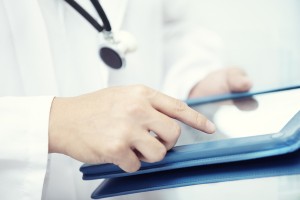 bigstock-Doctor-With-Tablet-Computer-36103063